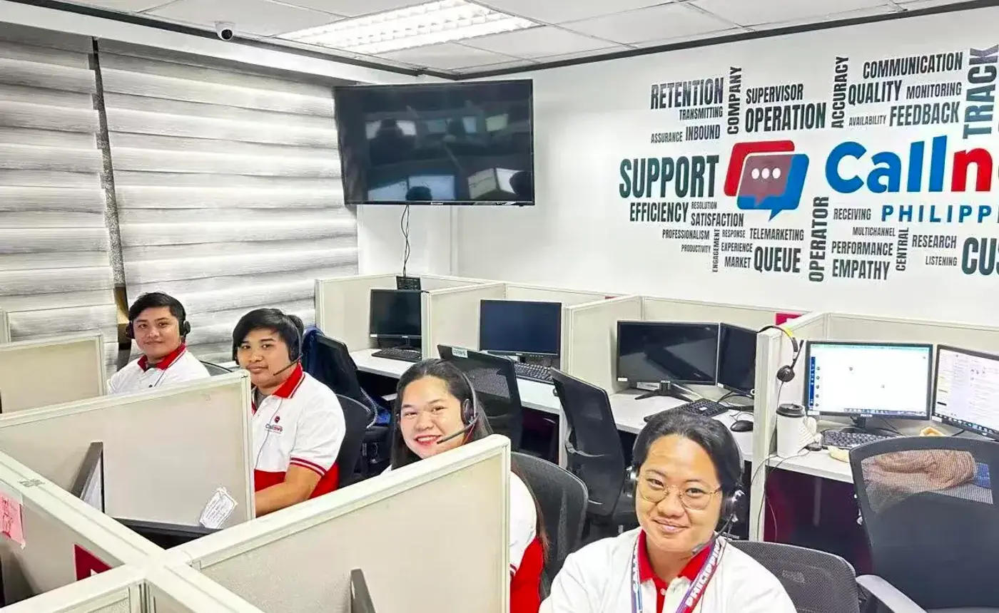 Callnovo support agents at workstations wearing headsets during customer service operations